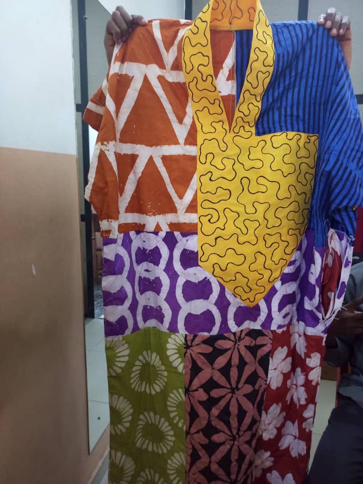 Adire kaftan gown with v-neck aso-oke and emb